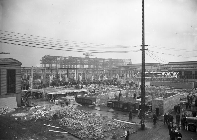 A black and white photograph of a building destroyed during the Blitz.